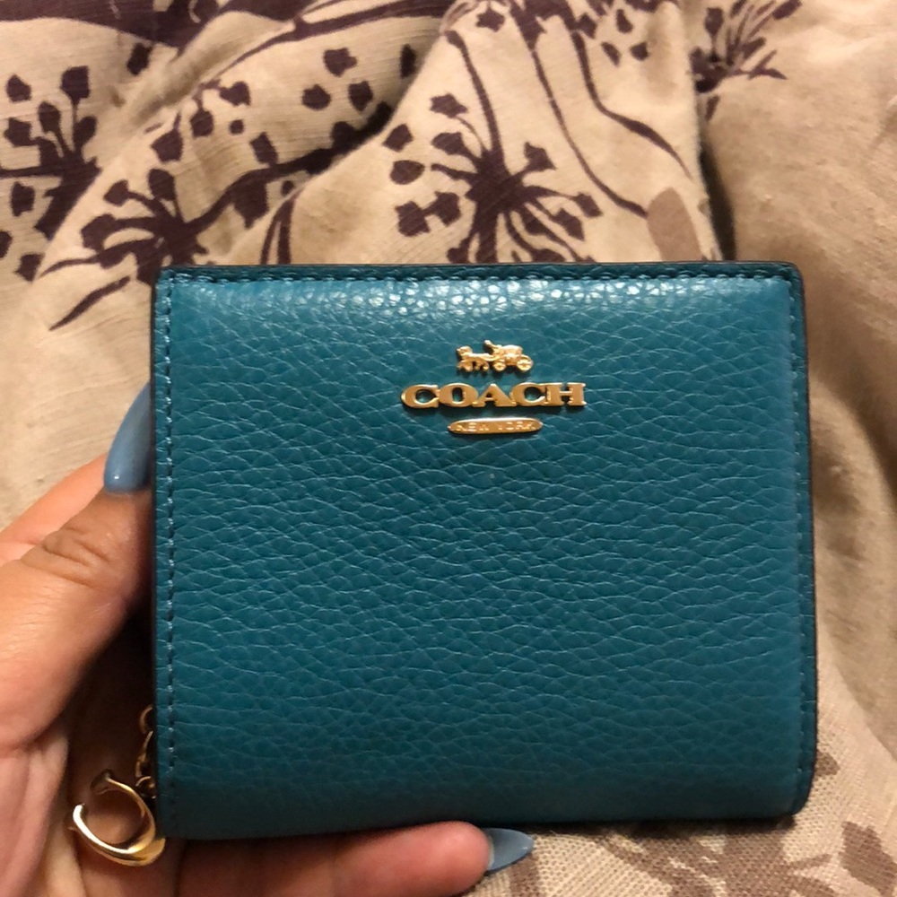 Small teal Coach wallet